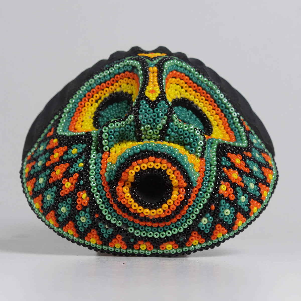 Máscara del Asombro – Redonda 10 cm, Verde y Naranja