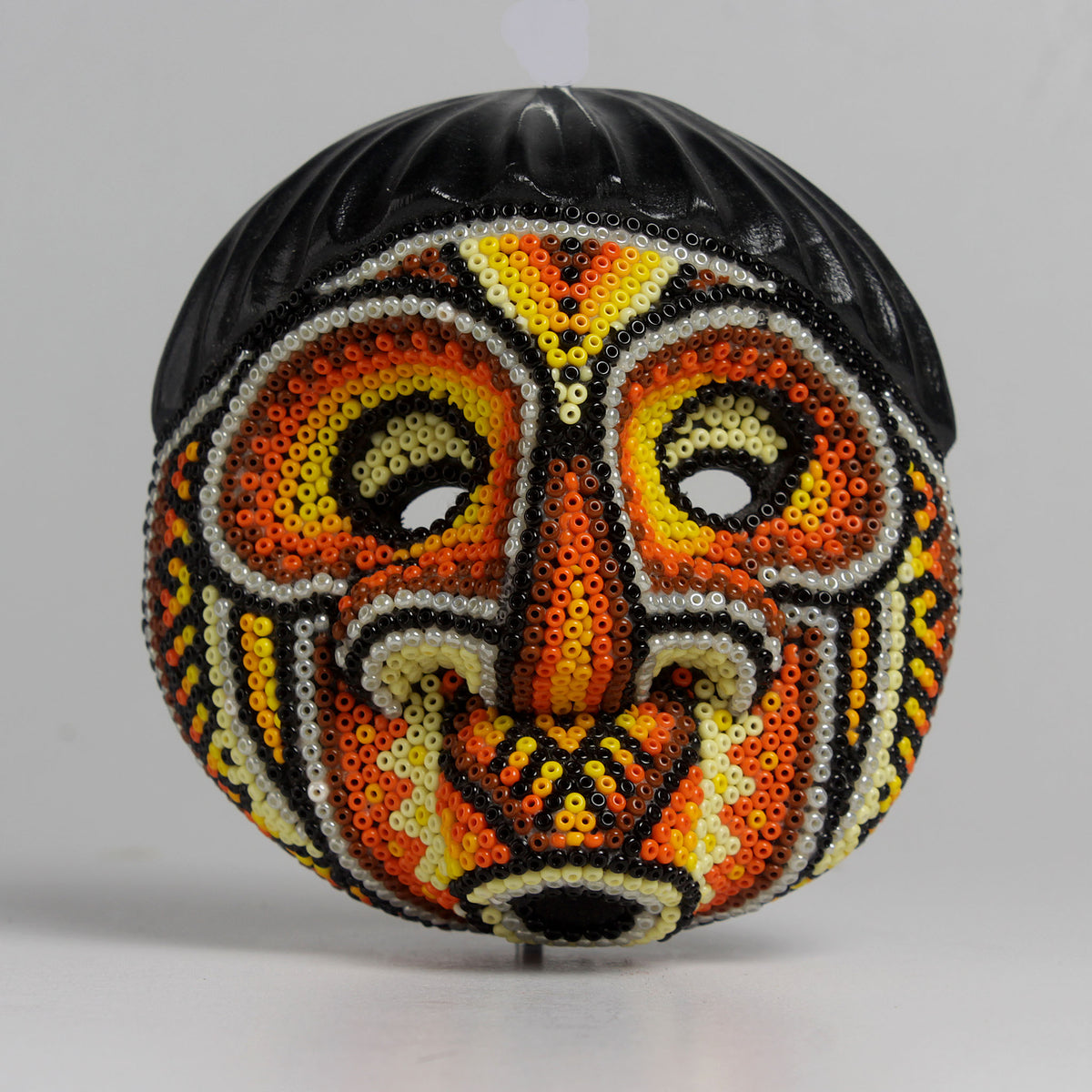 Máscara del Asombro – Redonda 10 cm, Naranja y Amarillo