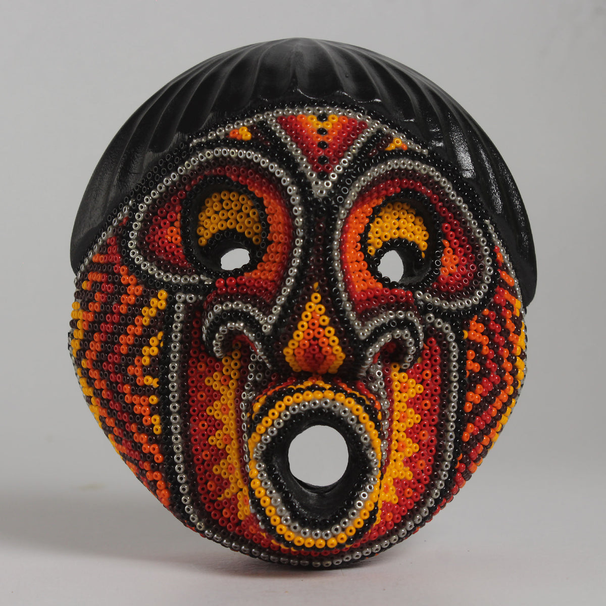 Máscara del Asombro – Redonda 12 cm, Naranja y Rojo