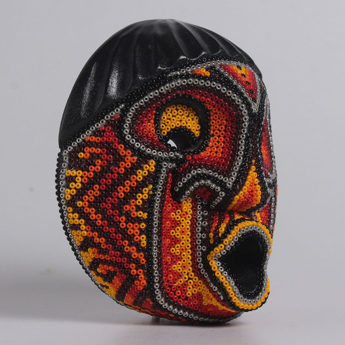 Máscara del Asombro – Redonda 12 cm, Naranja y Rojo