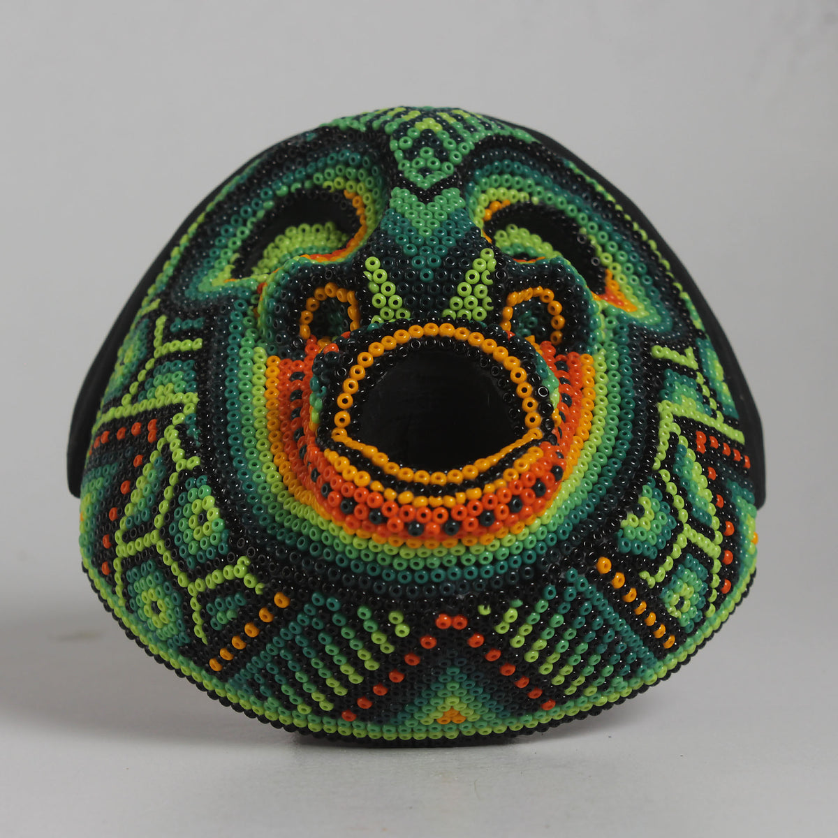 Máscara del Asombro – Redonda 12 cm, Verde y Naranja