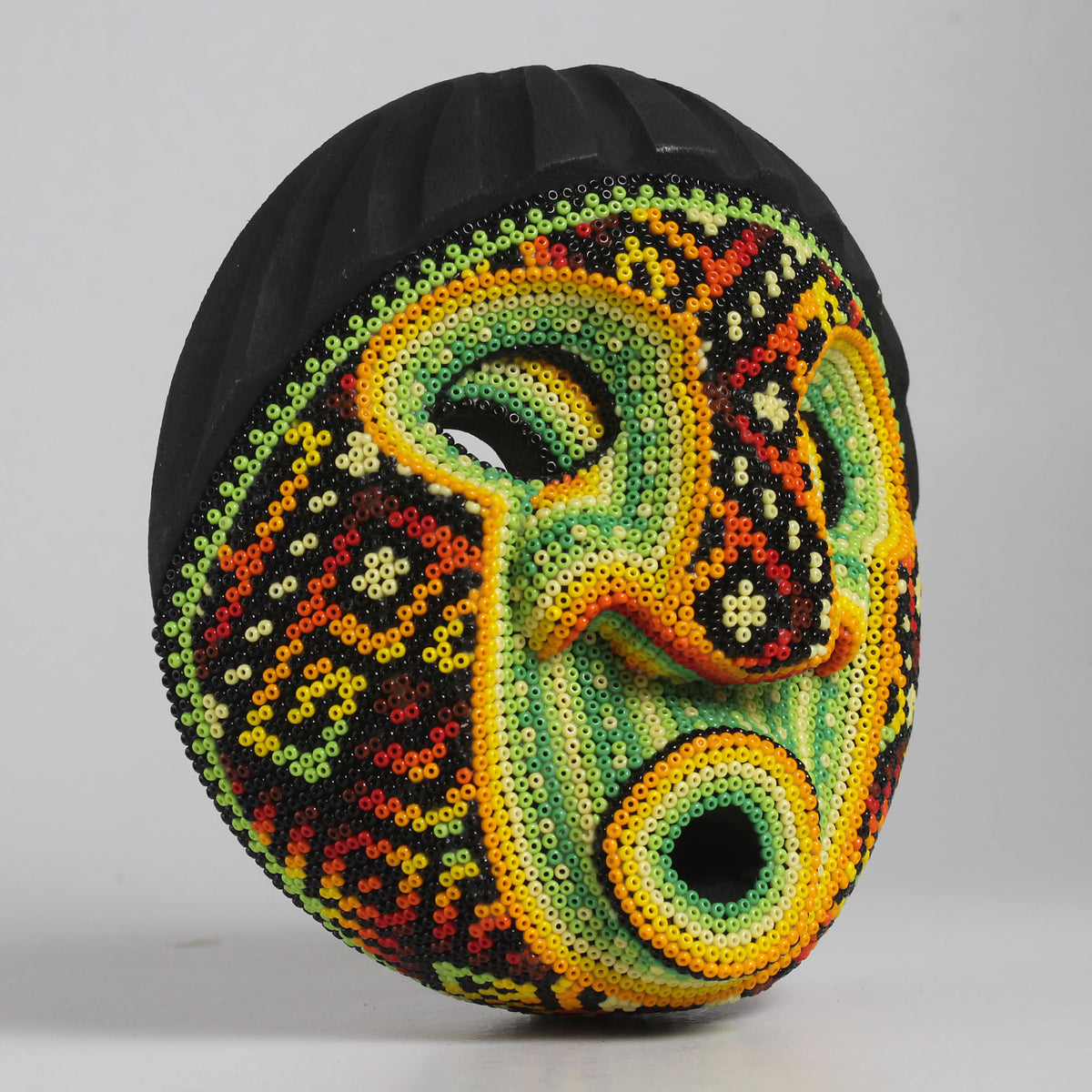 Máscara del Asombro – Redonda 15 cm, Verde y Amarillo