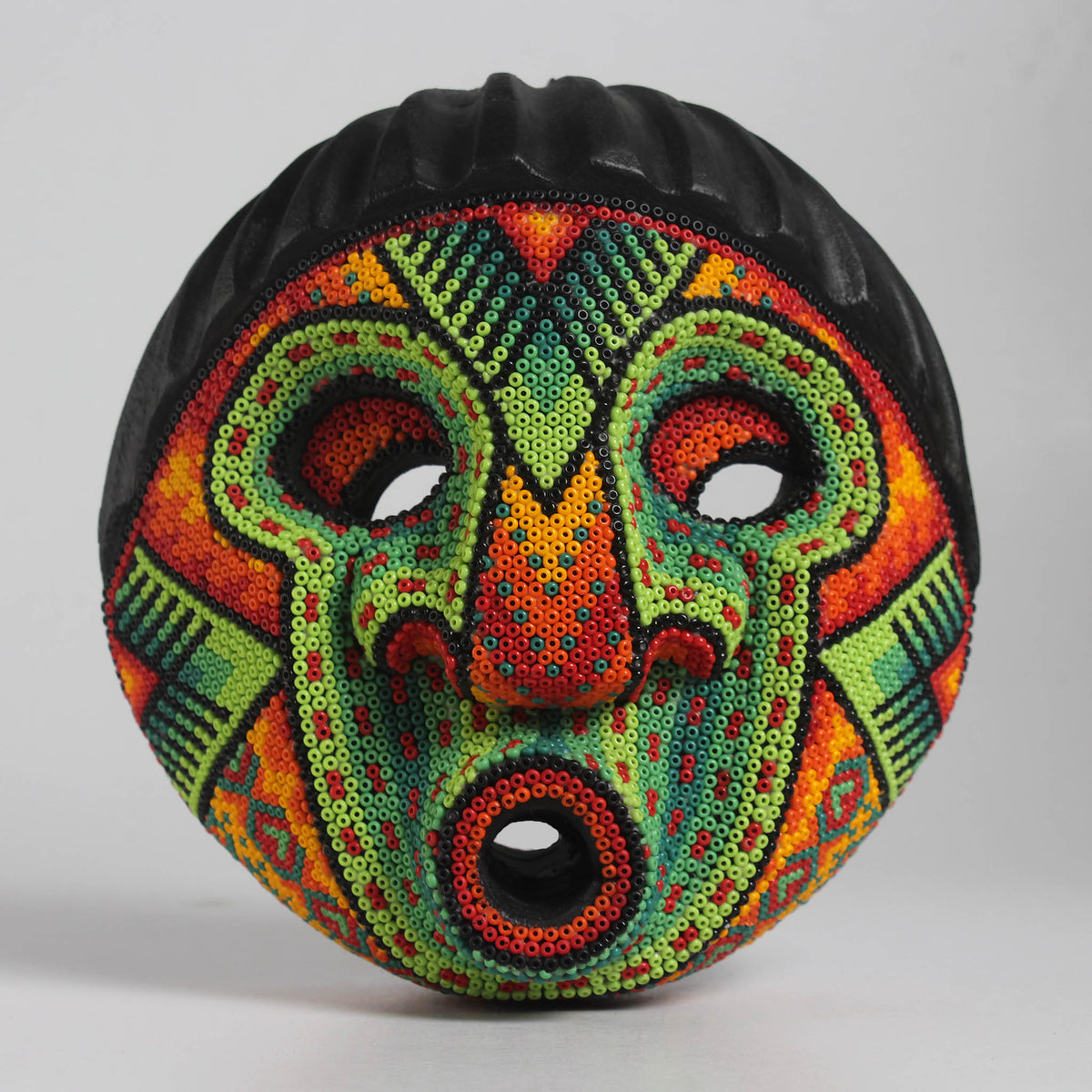 Máscara del Asombro – Redonda 15 cm, Verde y Naranja