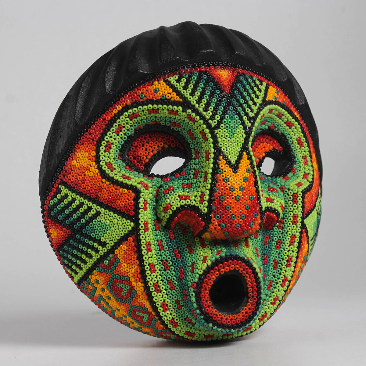 Máscara del Asombro – Redonda 15 cm, Verde y Naranja