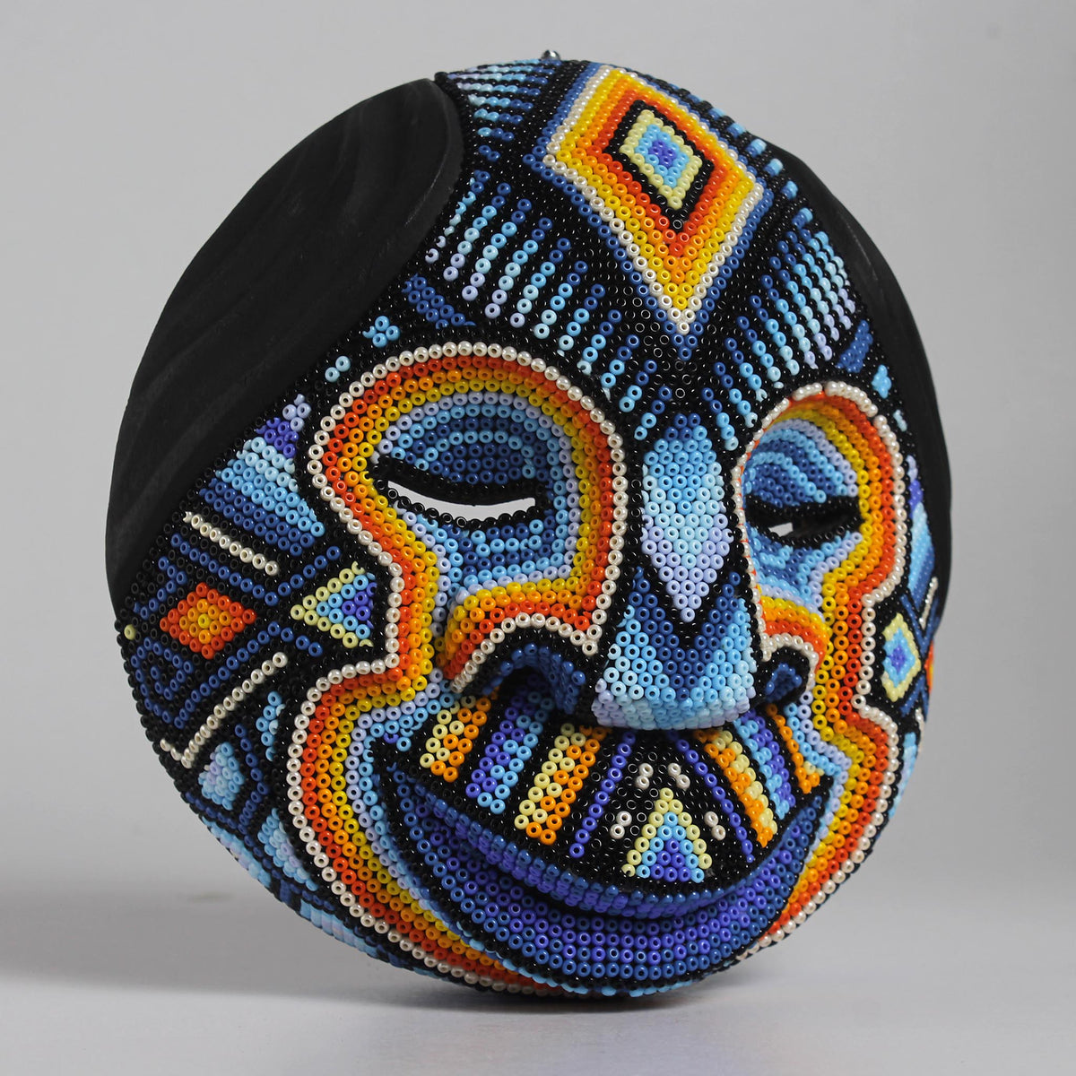 Máscara del Pensamiento Bonito – Redonda 15 cm, Azul Celeste y Naranja