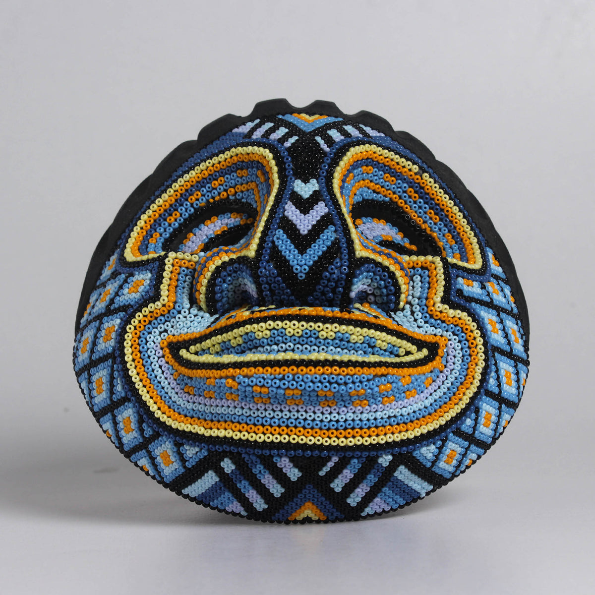 Máscara del Pensamiento Bonito – Redonda 15 cm, Azul y Naranja