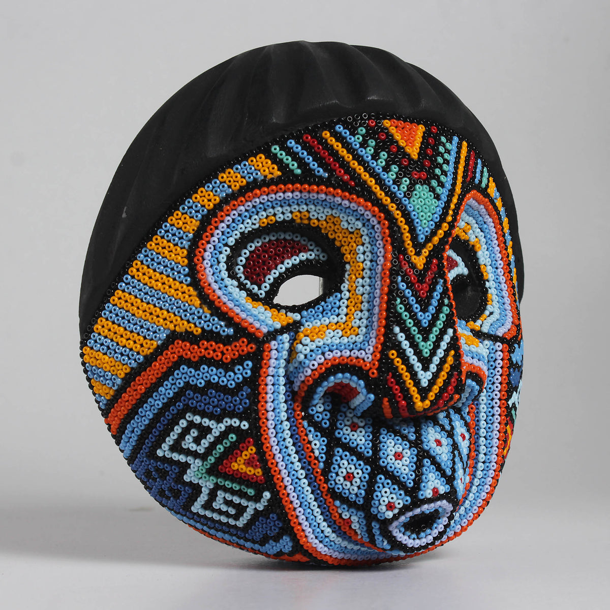 Máscara Silbando – Redonda 15 cm, Azul Celeste y Naranja